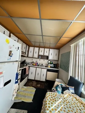 Older condo kitchen reviewed during the as-is walkthrough