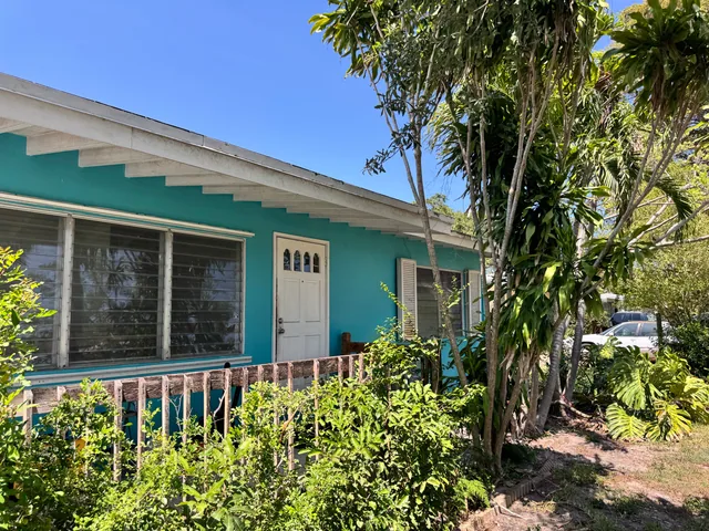 Lorraine Ct exterior showing the older North Palm Beach home reviewed for an as-is sale