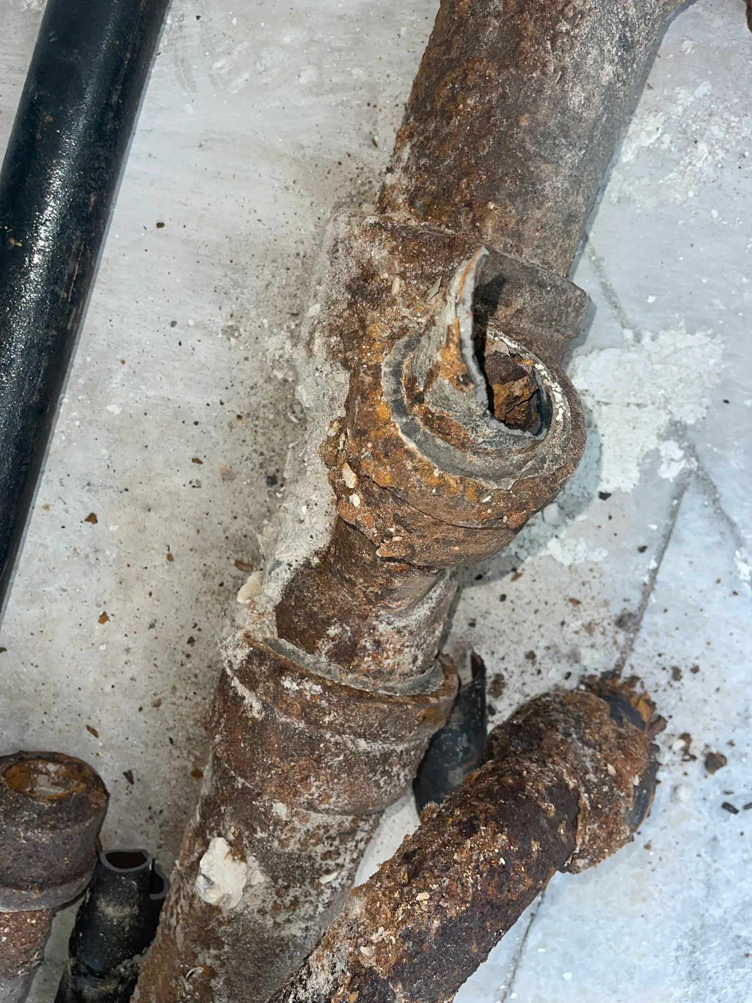 Older plumbing condition reviewed as part of the repair scope
